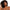 Femme noire aux cheveux naturels 4C souples et volumineux pour illustrer les soins Kaylabé