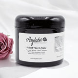 Masque au chébé Kaylabé pour fortifier les cheveux afro fragiles et aider à limiter la casse des longueurs